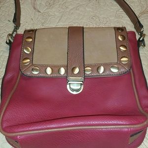 MMS crossbody bag  color is deep red and tan